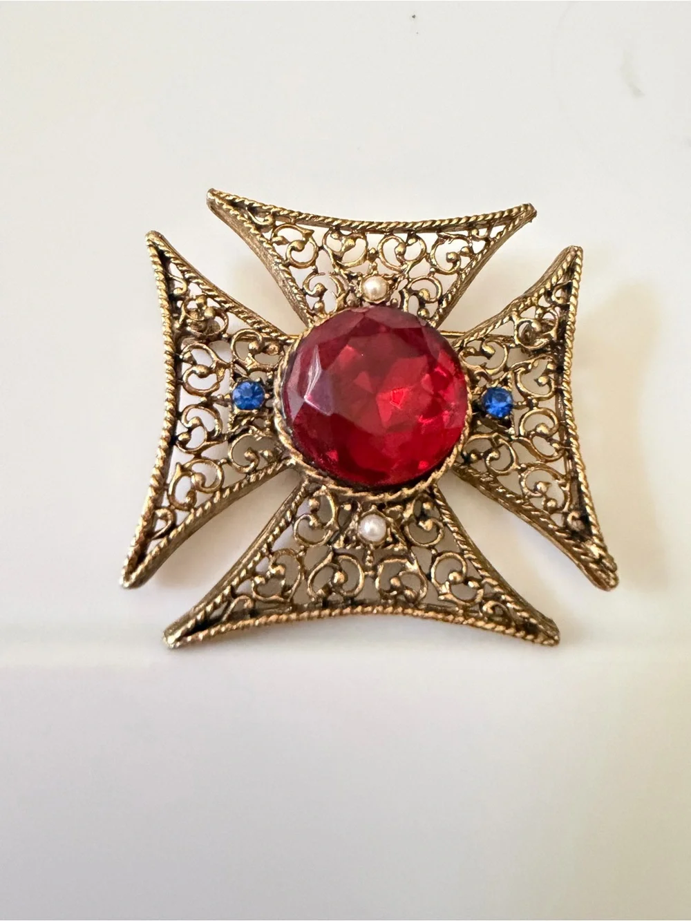 Gold-Tone Filigree Cross Brooch with Red Glass Center. 1 3/4” Large